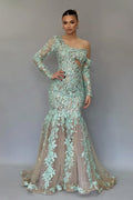 Impresionante vestido de fiesta largo de sirena con un solo hombro, encaje, pedrería y mangas largas.