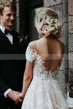 Robe de mariée princesse en dentelle florale à épaules dénudées