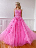 Elegantes vestidos largos de corte A, sin tirantes, con tul, encaje y espalda descubierta, ideales para graduaciones y fiestas de fin de curso.
