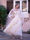 Vestido largo de tul con escote corazón y encaje bordado