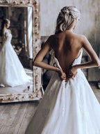 Robe de mariée en tulle à bustier et traîne balayée, ornée d'appliques, référence WD442