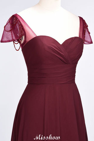 Vestido de dama de honor largo hasta el suelo con escote corazón, mangas cortas, volantes y pedrería. Moher if the Bride Dresses