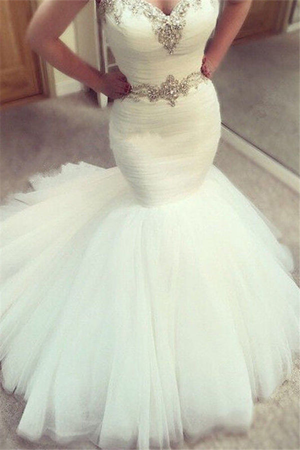 Vestido de novia sirena con volantes y escote corazón