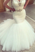 Vestido de novia sirena con volantes y escote corazón