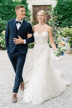 Robe de mariée sirène bustier sans manches en tulle ornée d'appliqués de dentelle