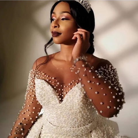 Vestido de novia de sirena con escote corazón y sobrefalda