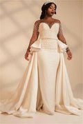 Vestido de novia de sirena con escote corazón y sobrefalda