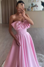 Tomie | Vestido largo de fiesta formal rosa, corte A, sin tirantes, con lazo y plisado de satén