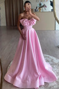 Tomie | Vestido largo de fiesta formal rosa, corte A, sin tirantes, con lazo y plisado de satén