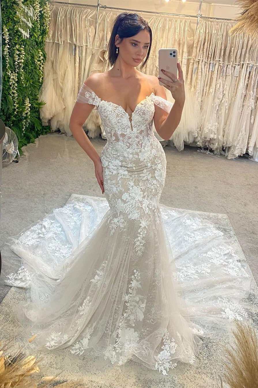 Vestido de novia de encaje de moda, largo hasta el suelo, sin mangas, con escote corazón y hombros descubiertos, con cola de capilla.