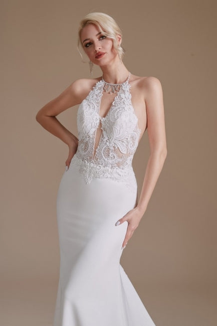 Robe de mariée sirène unique en satin, sans manches, dos nu et à motifs. 