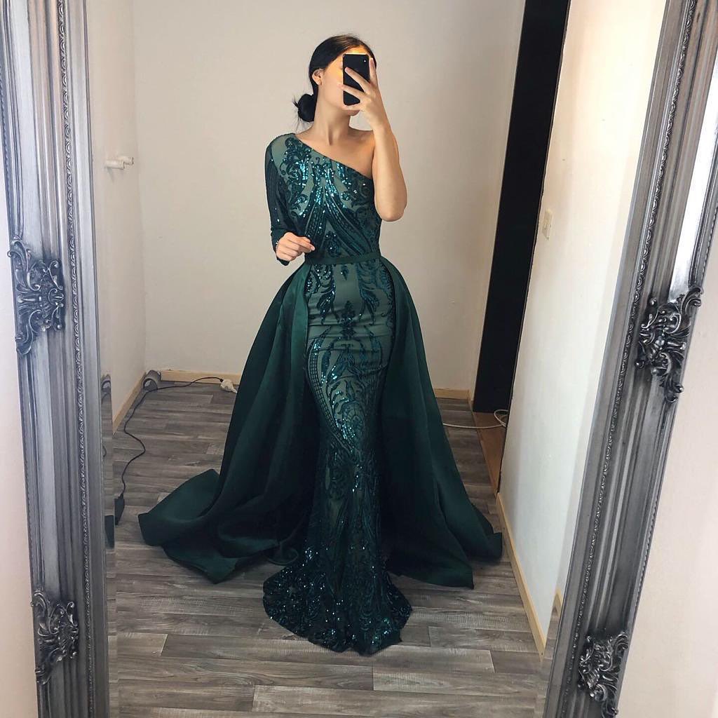 Vestido largo de fiesta único estilo sirena, con lentejuelas, un solo hombro y mangas.