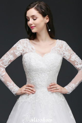 Vestidos de novia de tul y encaje con escote en V