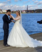 Vestidos de novia vintage de encaje corte A con mangas