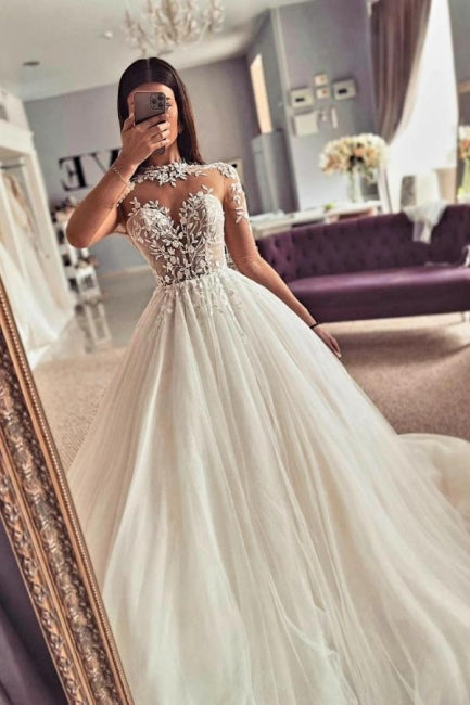 Robes de mariée vintage en tulle et dentelle à manches longues et coupe trapèze, ornées de bijoux