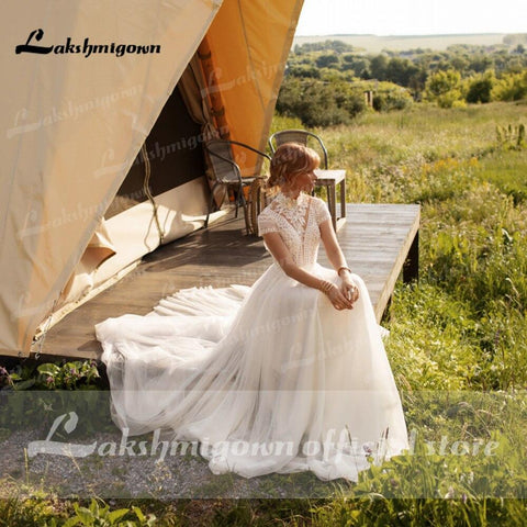 Robe de mariée Baoleely en dentelle et tulle, col haut, manches courtes, coupe trapèze
