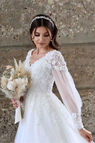 Vestido de novia blanco de tul, corte en A, manga larga y encaje