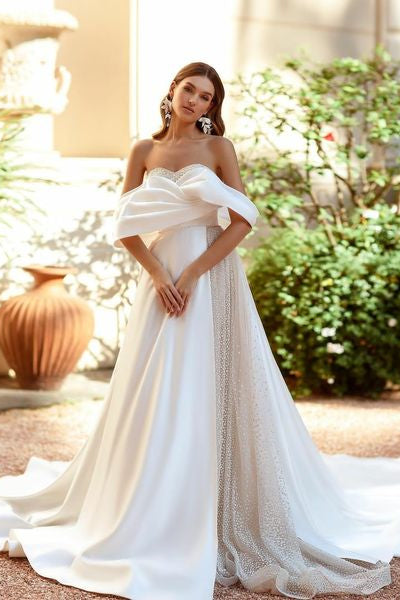 Vestido de novia blanco de corte A con lentejuelas, hombros descubiertos y volantes