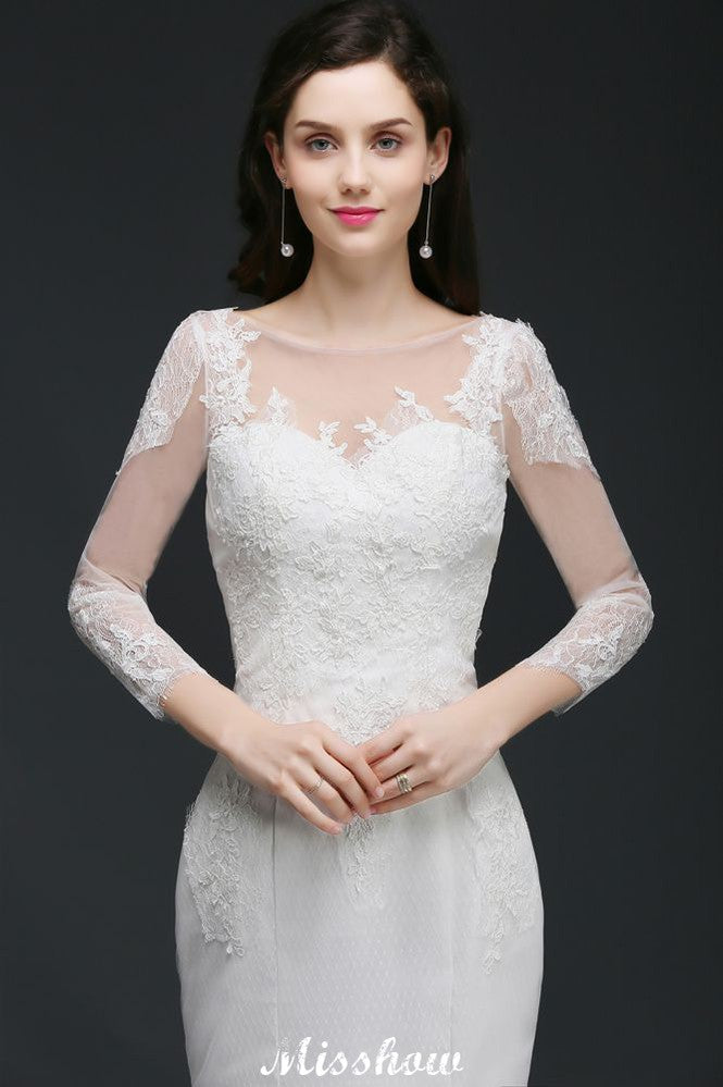 Robe de mariée sirène en dentelle blanche ornée de bijoux