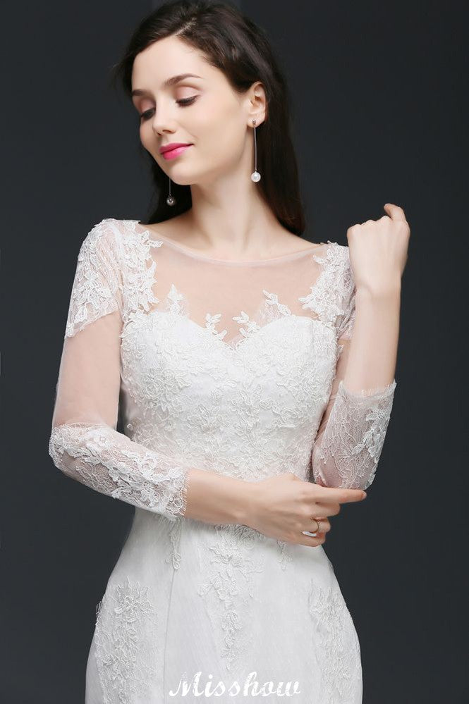 Robe de mariée sirène en dentelle blanche ornée de bijoux